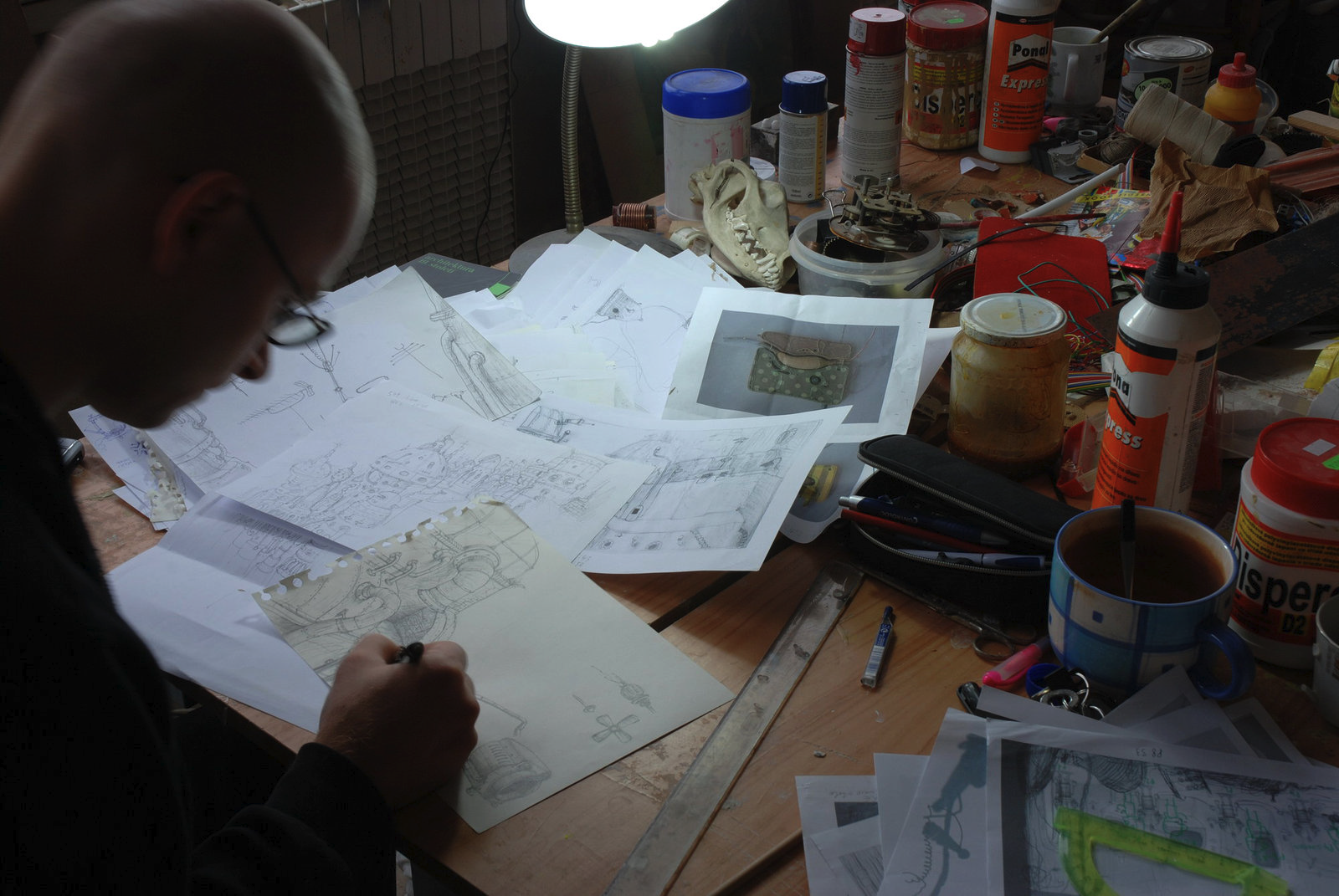 Amanita Design work table covered with Machinarium sketches